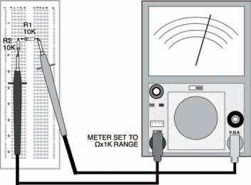 Two resistors mounted on the breadboard in series