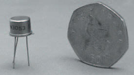 A transistor next to a UK fifty pence piece